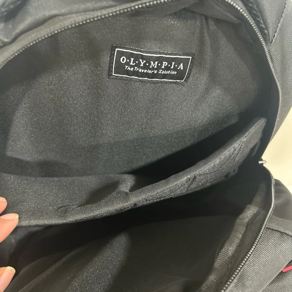 Compact Black Men's Backpack with Subtle Red Accents